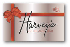 Harveys logo over silver background with red gift bow